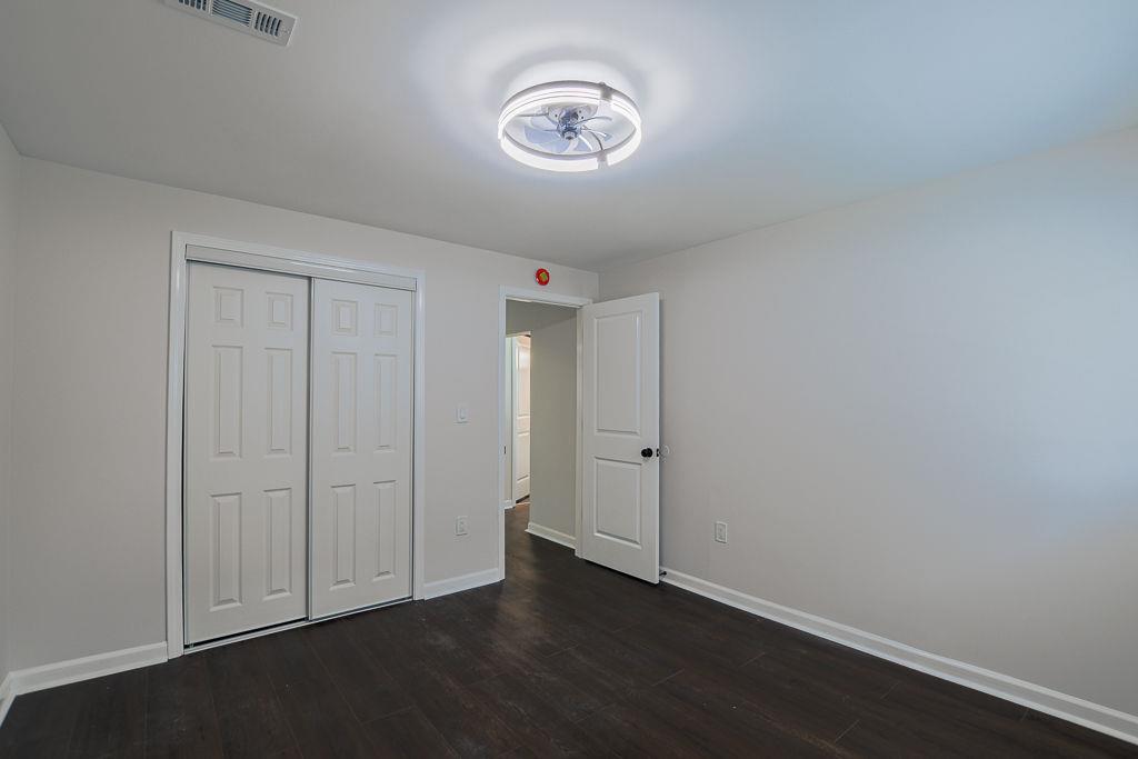 2248 Willoby Court Morrow, GA 30260 - Photo 25 of 31 a view of an empty room with wooden floor