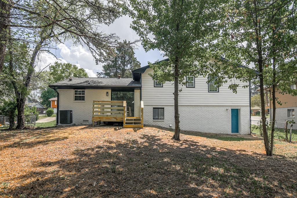 2248 Willoby Court Morrow, GA 30260 - Photo 26 of 31 a view of a house with a tree in the background