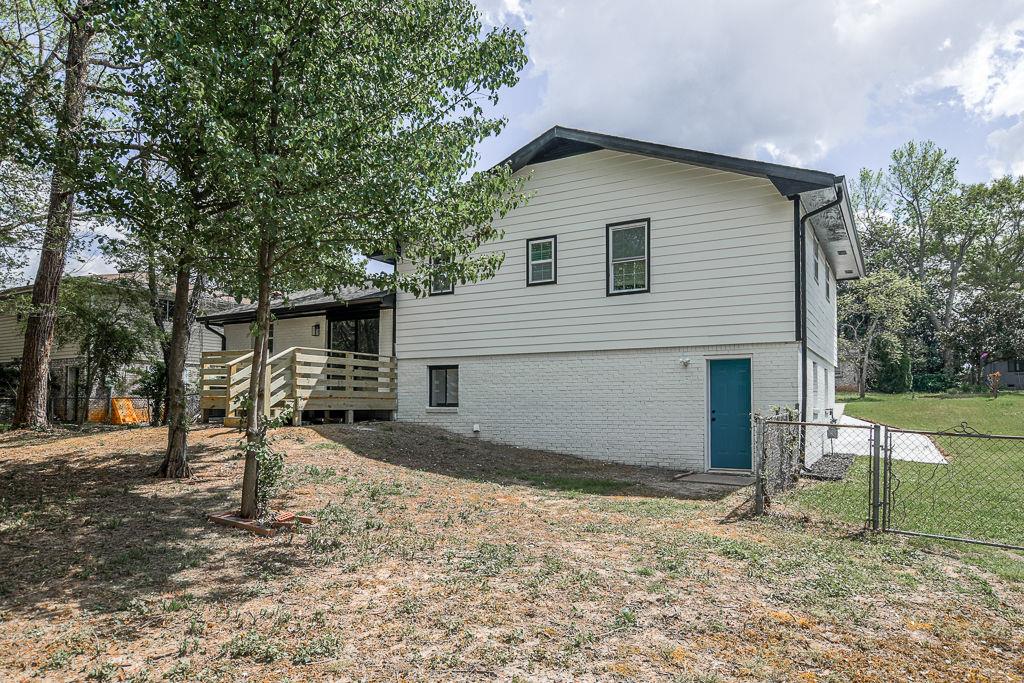 2248 Willoby Court Morrow, GA 30260 - Photo 29 of 31 a view of a house with a yard