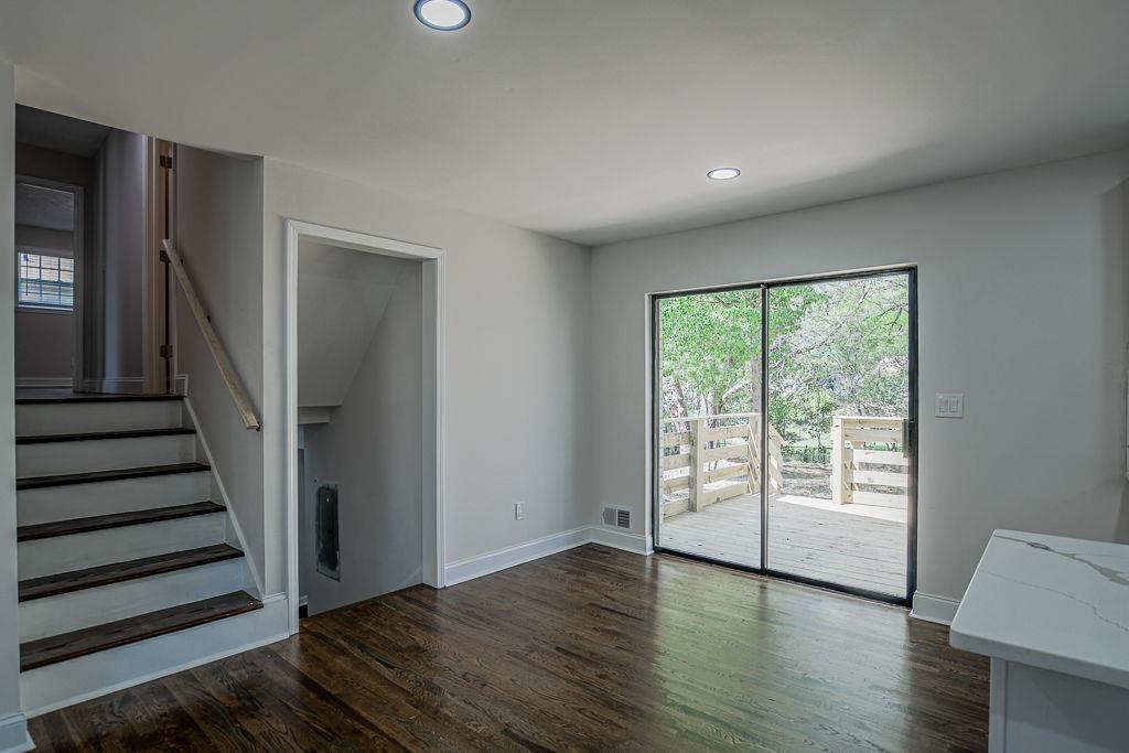 2248 Willoby Court Morrow, GA 30260 - Photo 10 of 31 a view of a room with wooden floor and white walls