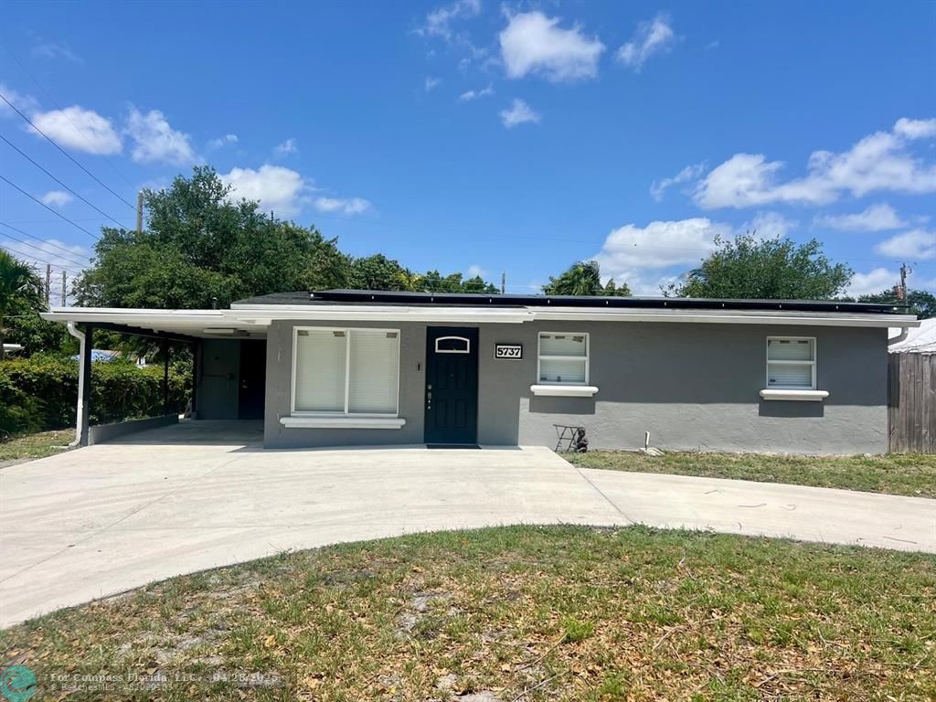 5737 Greene Street Hollywood, FL 33021 - Photo 1 of 13 a house view with a outdoor space