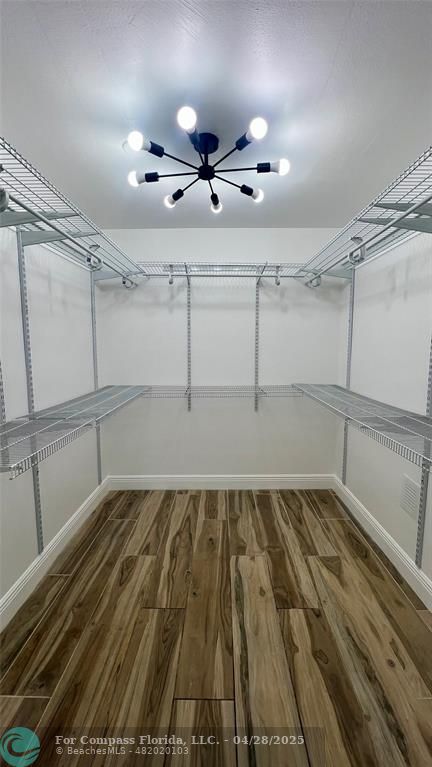 5737 Greene Street Hollywood, FL 33021 - Photo 7 of 13 a view of a room with wooden floor