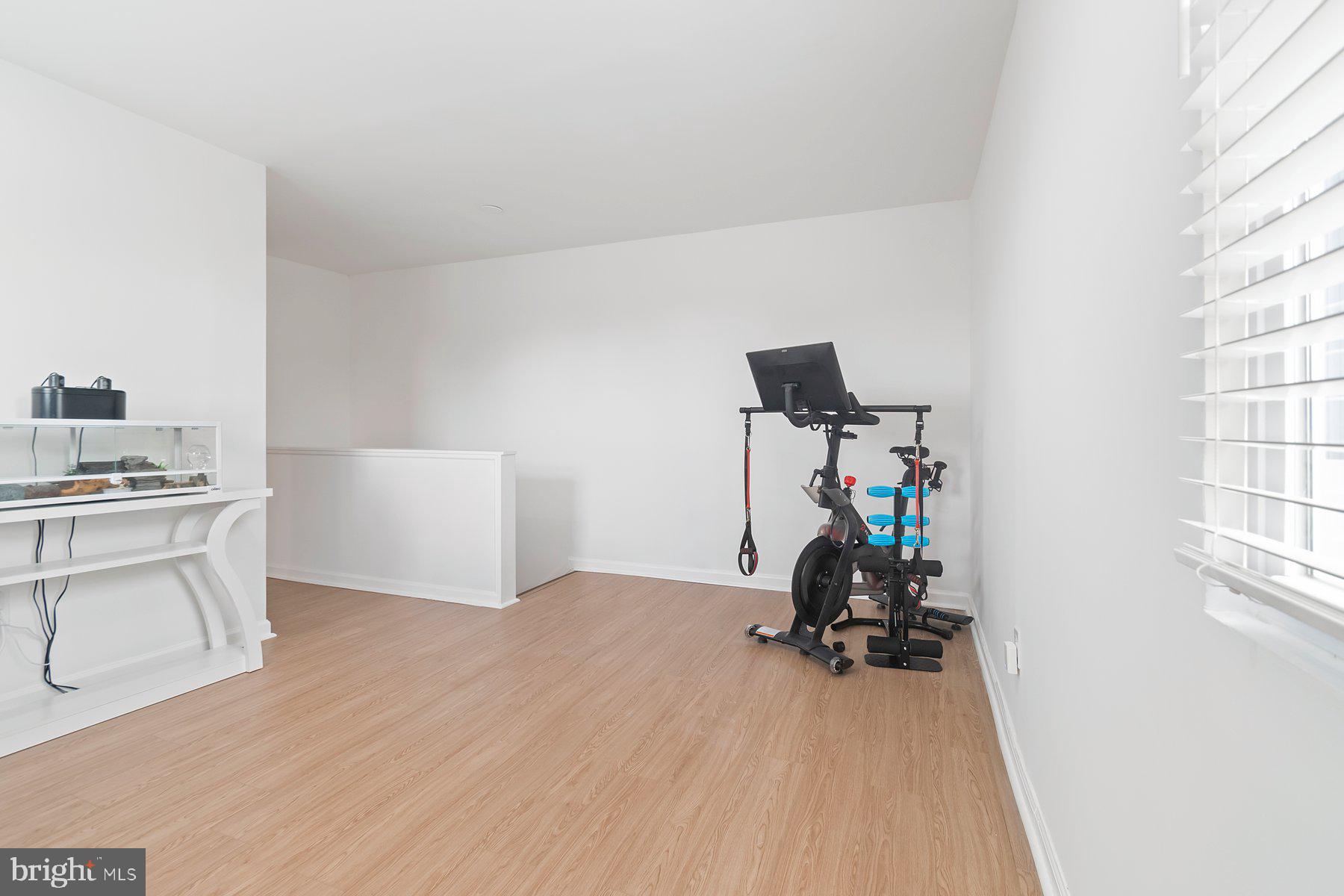 1221 East Oliver Street Baltimore, MD 21202 - Photo 14 of 26 a view of workspace with furniture and windows