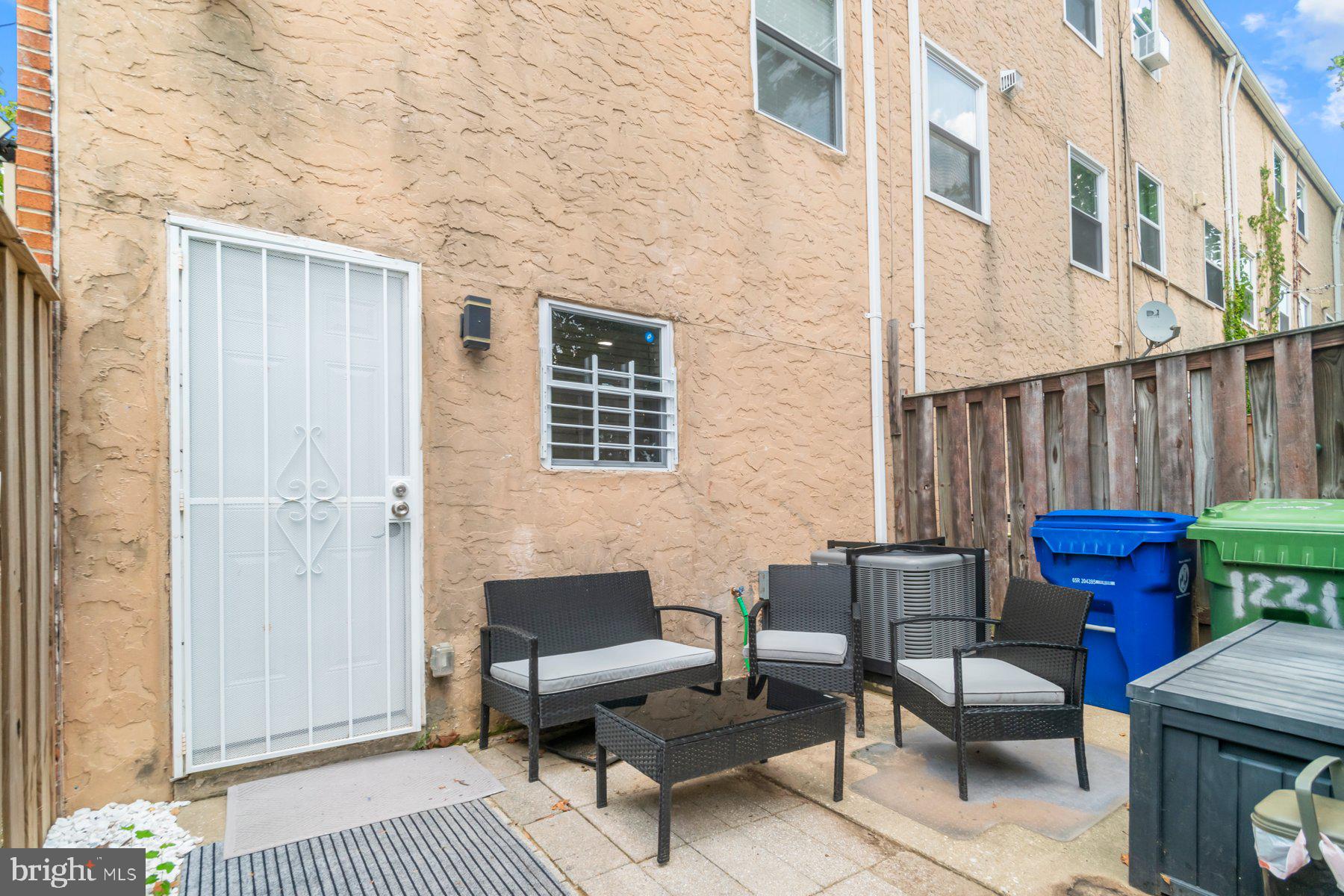 1221 East Oliver Street Baltimore, MD 21202 - Photo 23 of 26 a outdoor living space with furniture