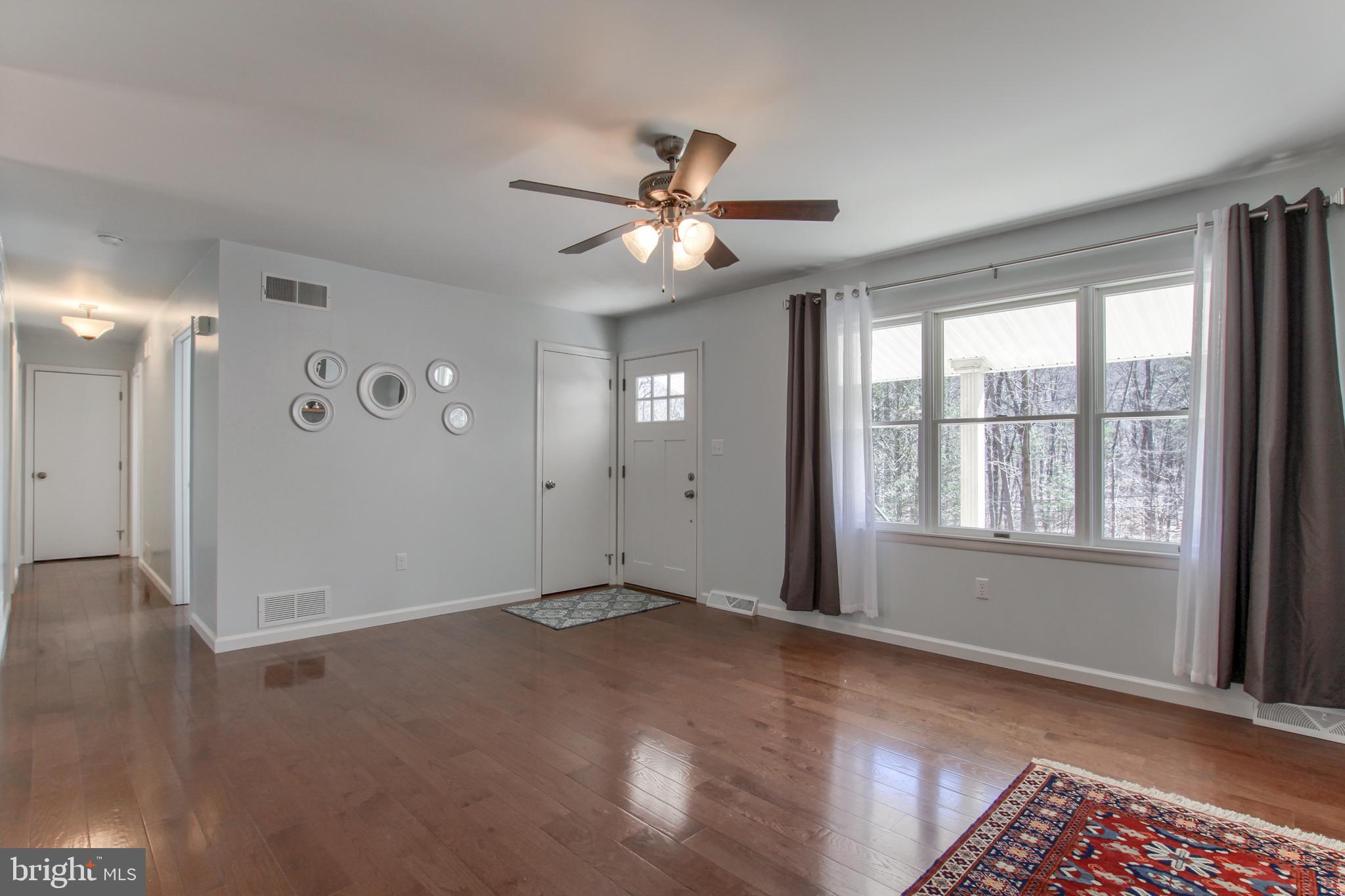 1055 Bower Road Shermans Dale, PA 17090 - Photo 15 of 30 Living Room With Plenty of Natural Light