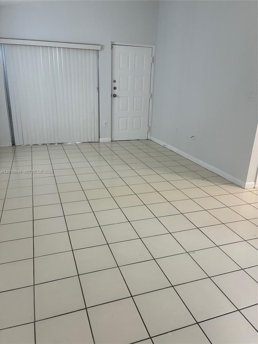 7640 Southwest 153rd Court, Unit 207 Miami, FL 33193 - Photo 2 of 8 a view of empty room
