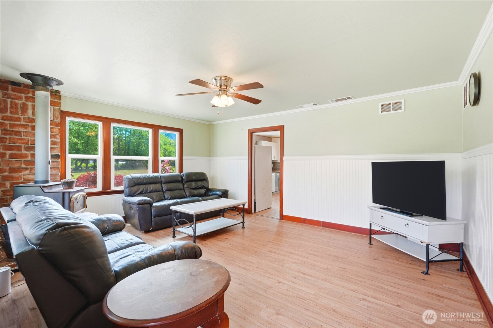 21716 State Rte 530 Northeast Arlington, WA 98223 - Photo 13 of 38 a living room with furniture and a flat screen tv