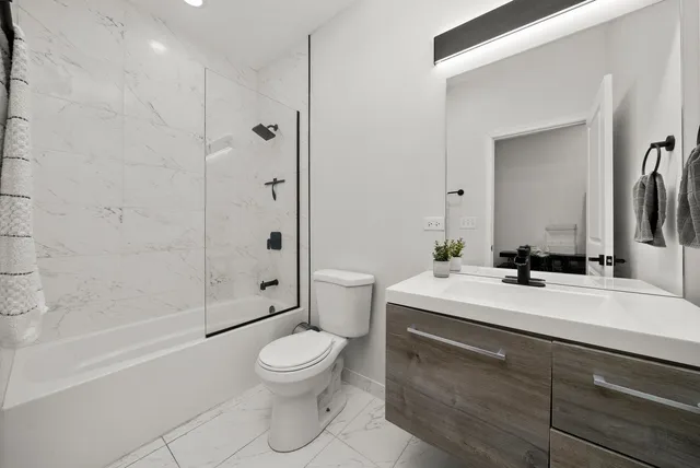 a view of kitchen island with wooden floor
