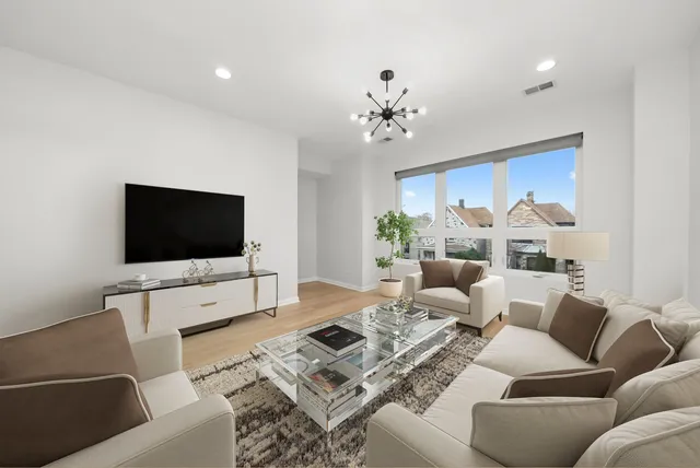 a bedroom with bed and window