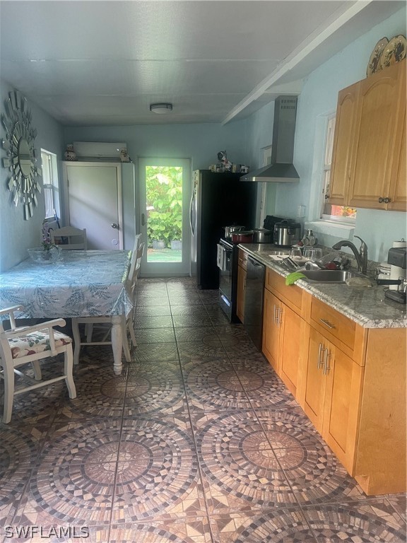 941 Happy Road North Fort Myers, FL 33903 - Photo 14 of 19 a kitchen with stainless steel appliances granite countertop a sink a stove top oven a counter space and cabinets