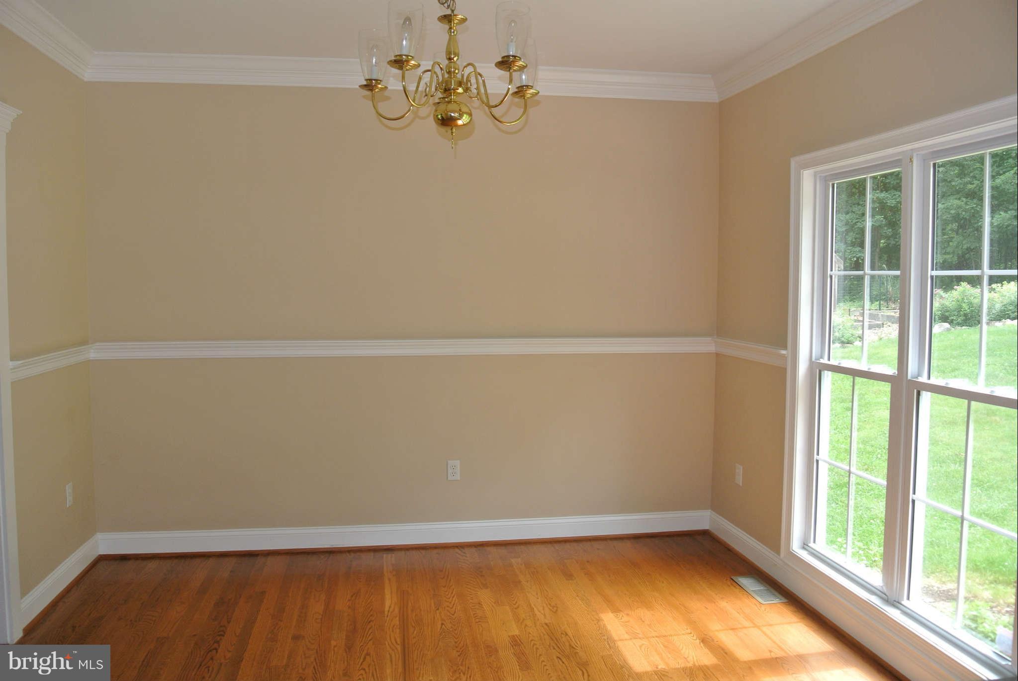 173 Cotton Ridge Road Winchester, VA 22603 - Photo 14 of 28 an empty room with a window
