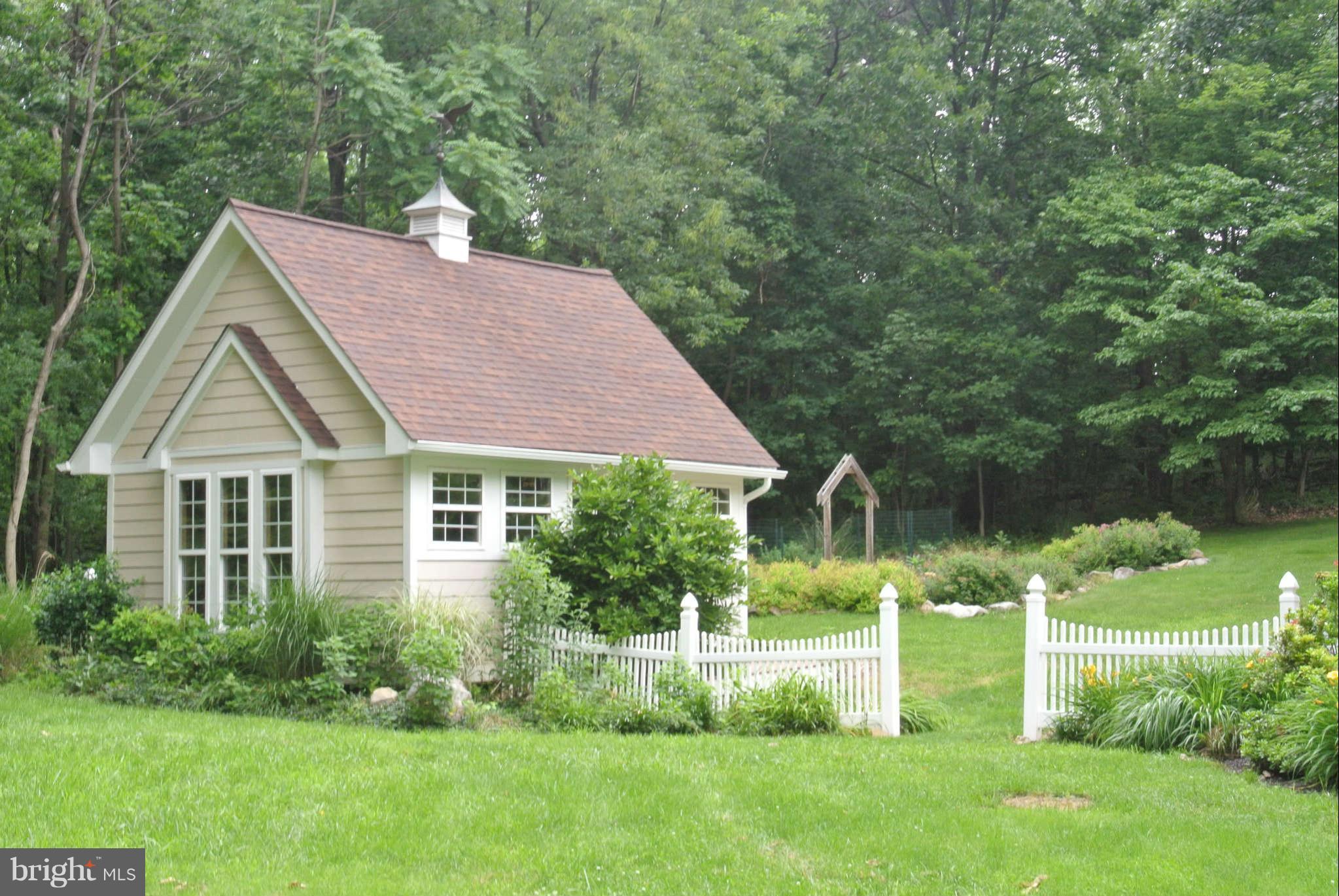 173 Cotton Ridge Road Winchester, VA 22603 - Photo 3 of 28 a view of a house with a yard