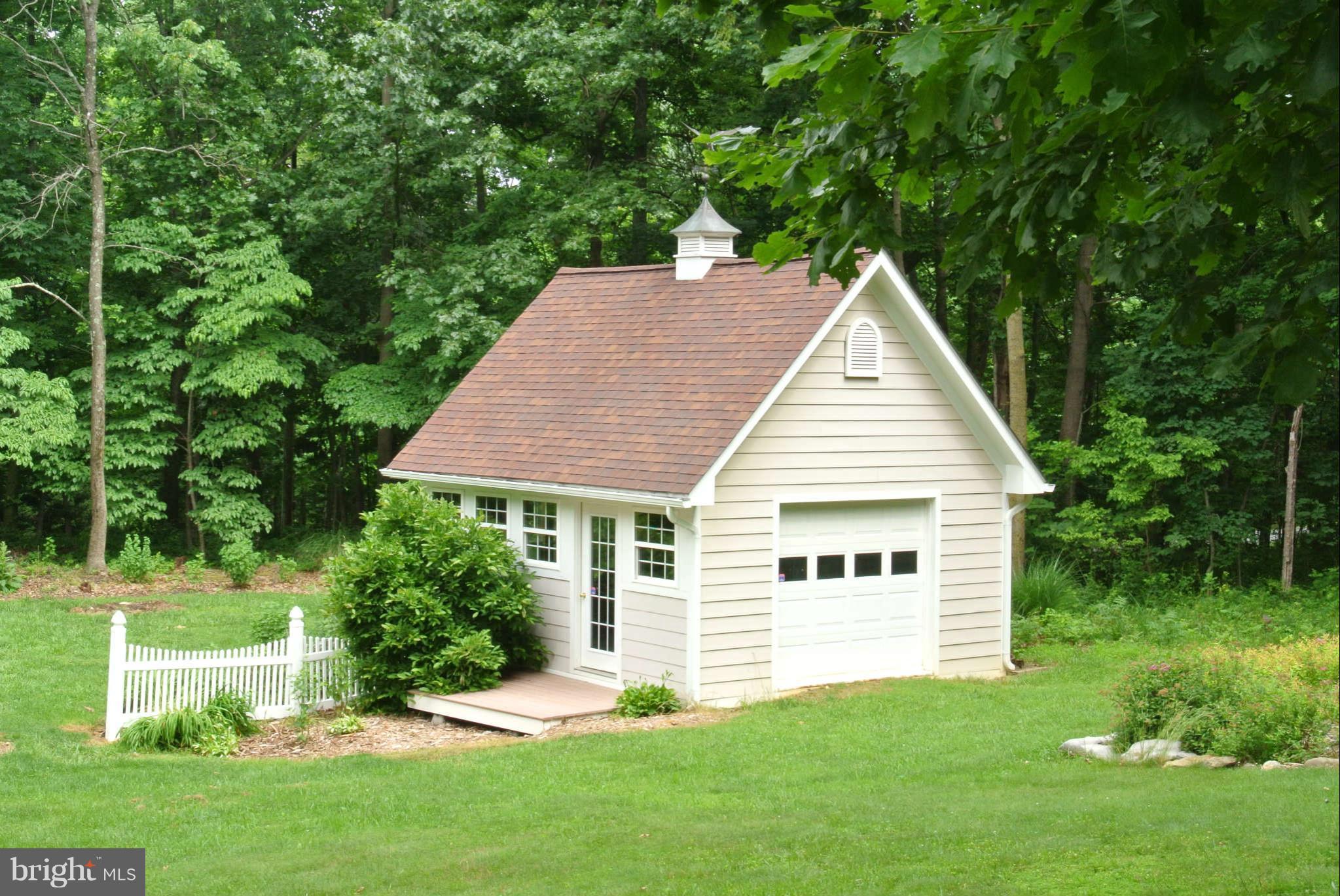 173 Cotton Ridge Road Winchester, VA 22603 - Photo 4 of 28 a view of a house with a yard