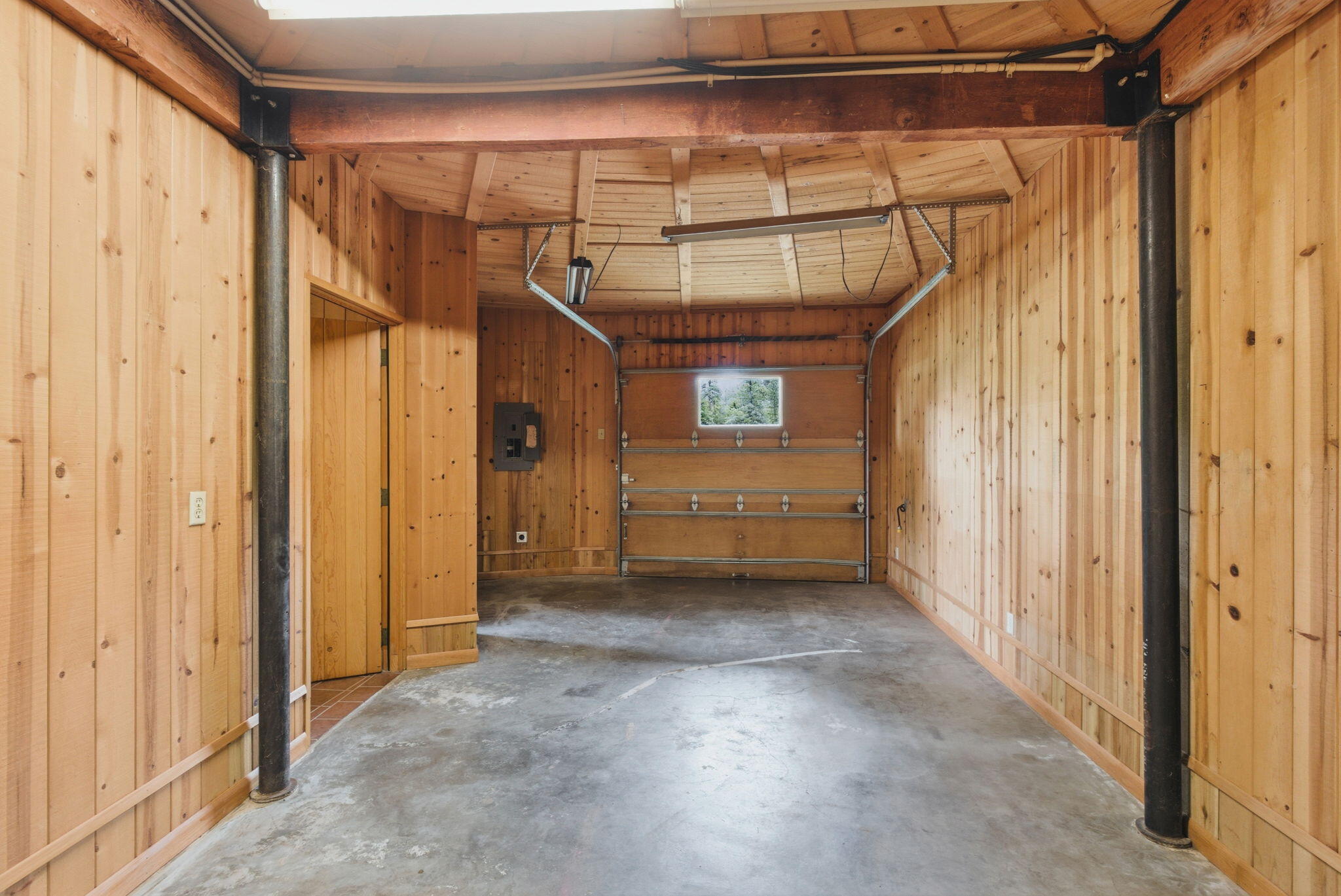 9595 Sterling Creek Road Jacksonville, OR 97530 - Photo 43 of 76 a view of a room with window and a garage