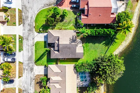 an aerial view of lake residential house with outdoor space