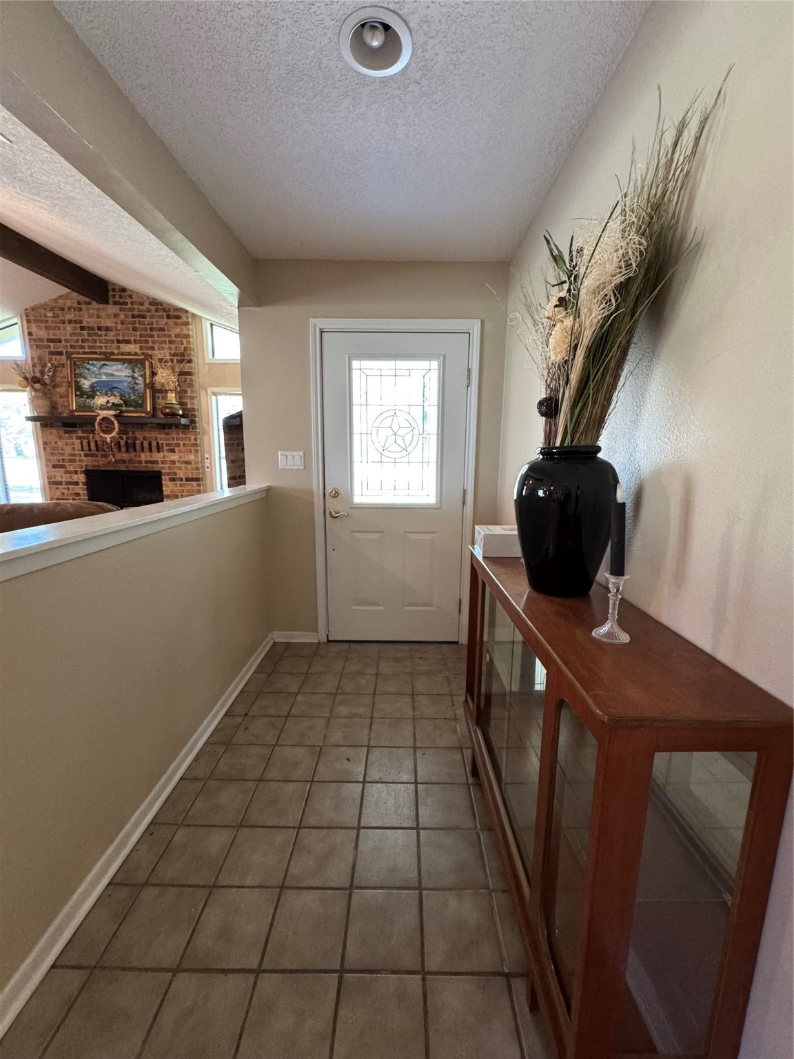 150 Schooner Drive Trinity, TX 75862 - Photo 11 of 49 a kitchen with a sink a window and cabinets