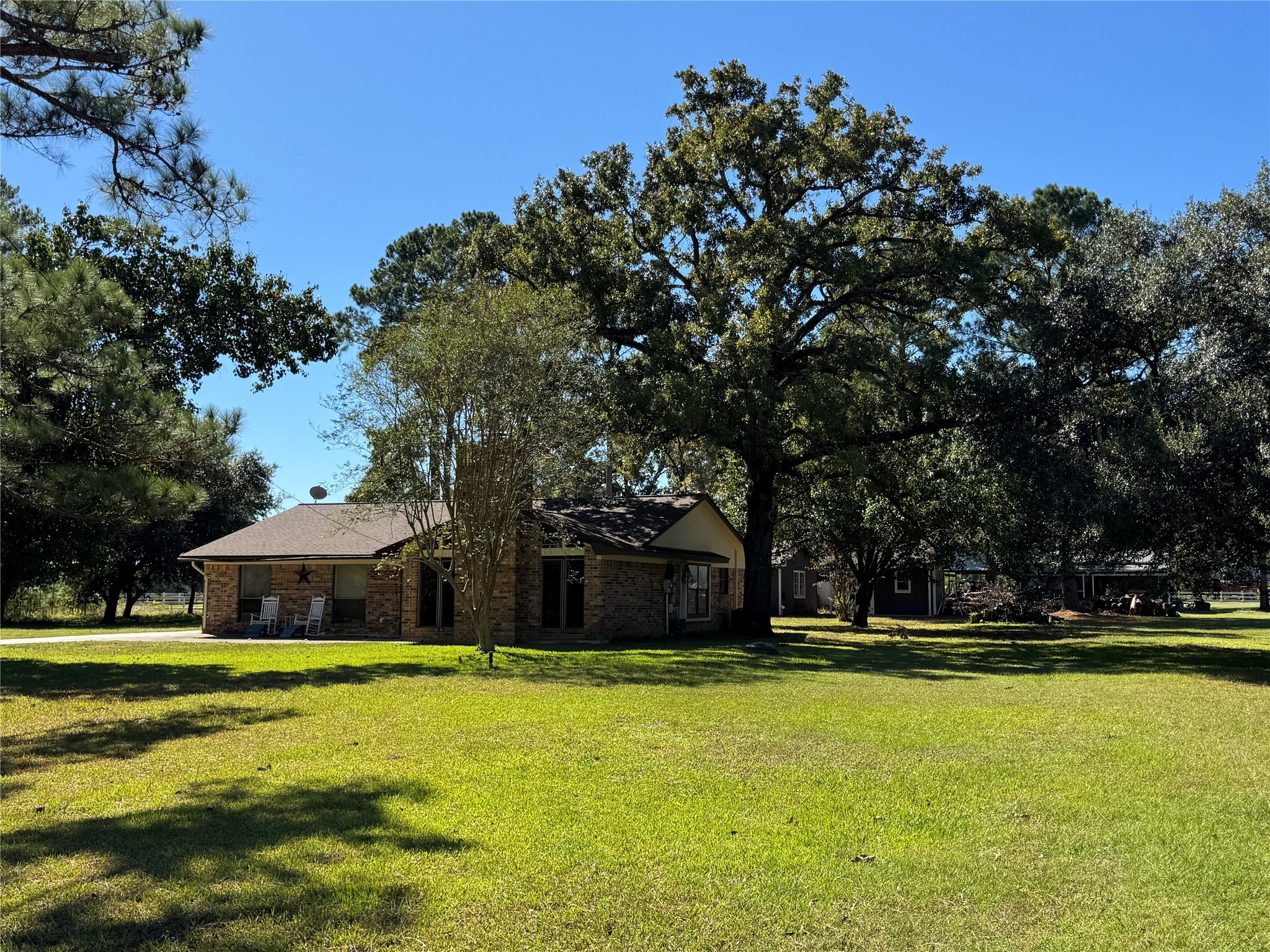 150 Schooner Drive Trinity, TX 75862 - Photo 2 of 49 a house view with swimming pool in front of it