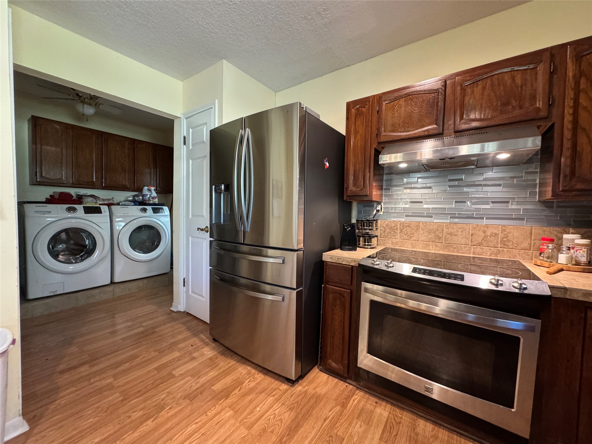 150 Schooner Drive Trinity, TX 75862 - Photo 21 of 49 a kitchen with a stove and a microwave