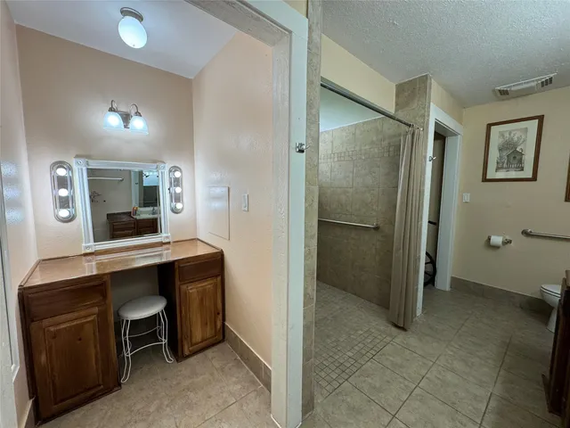 a view of a bathroom from the hallway