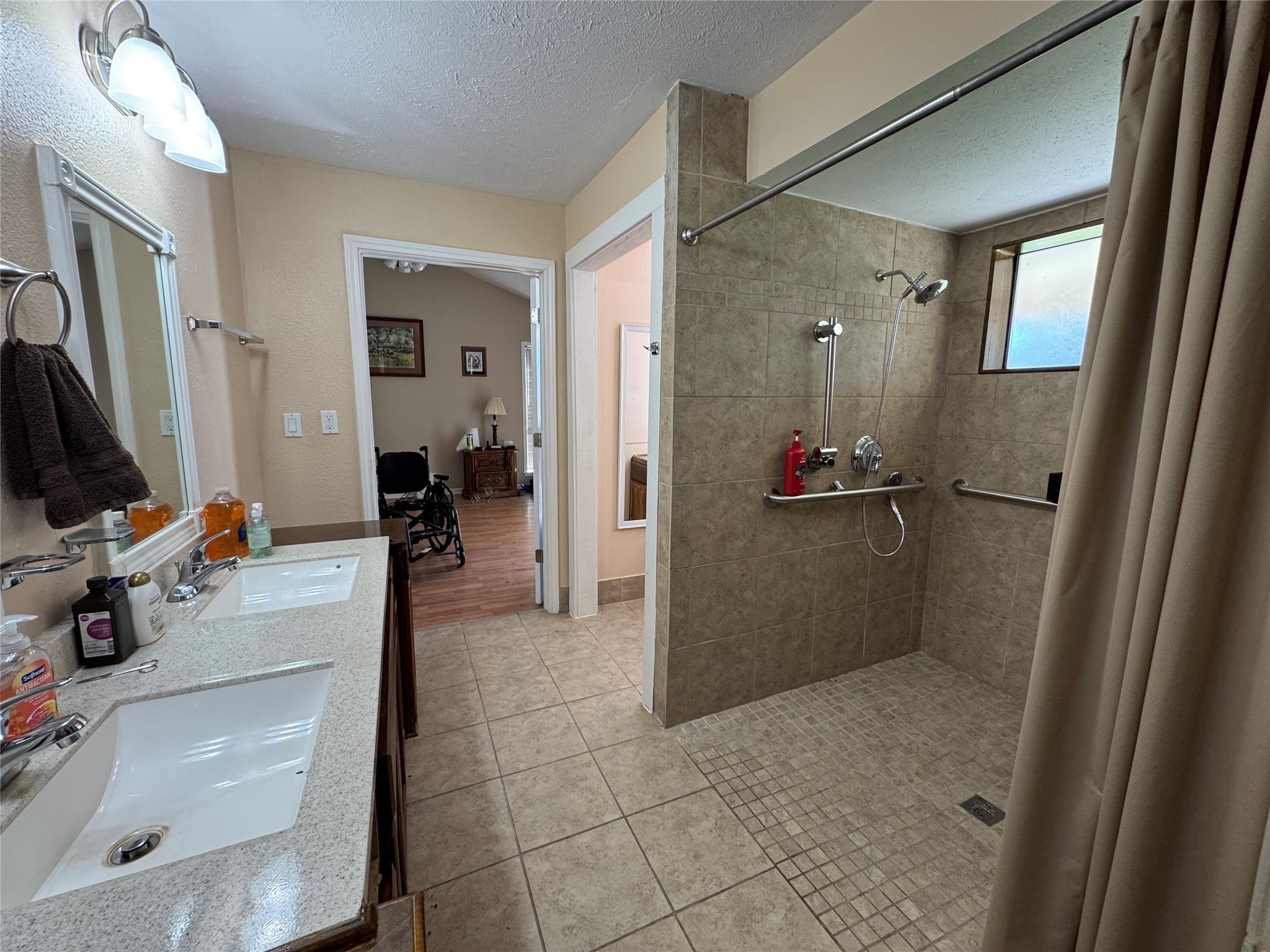 150 Schooner Drive Trinity, TX 75862 - Photo 32 of 49 a bathroom with a sink mirror toilet and shower