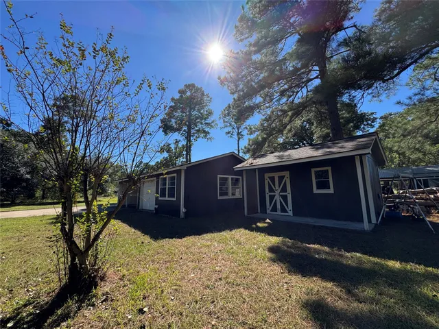 a house view with a outdoor space
