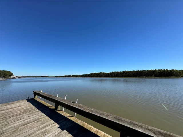 a view of a lake from a balcony