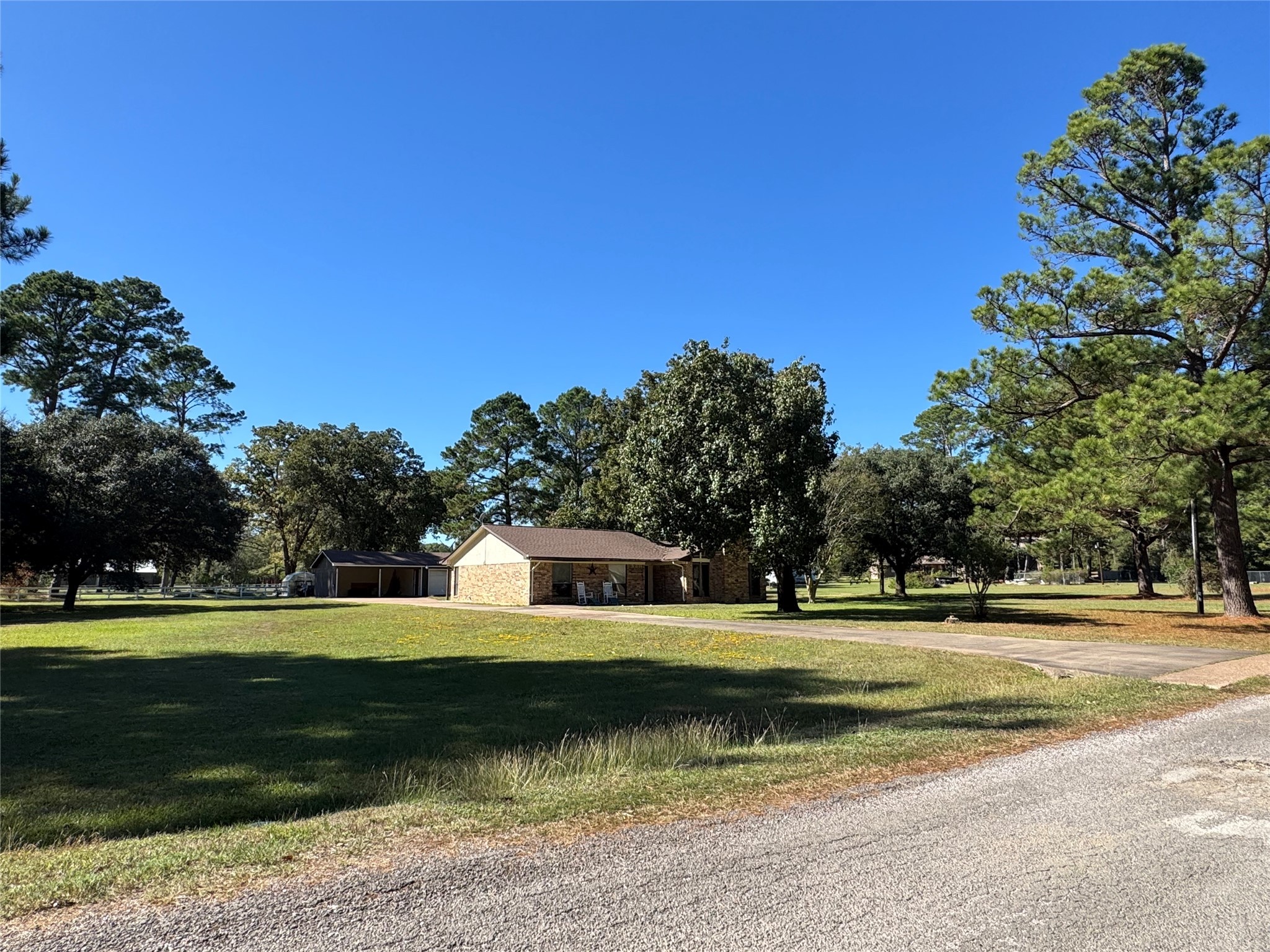 150 Schooner Drive Trinity, TX 75862 - Photo 5 of 49 a view of a swimming pool with a yard