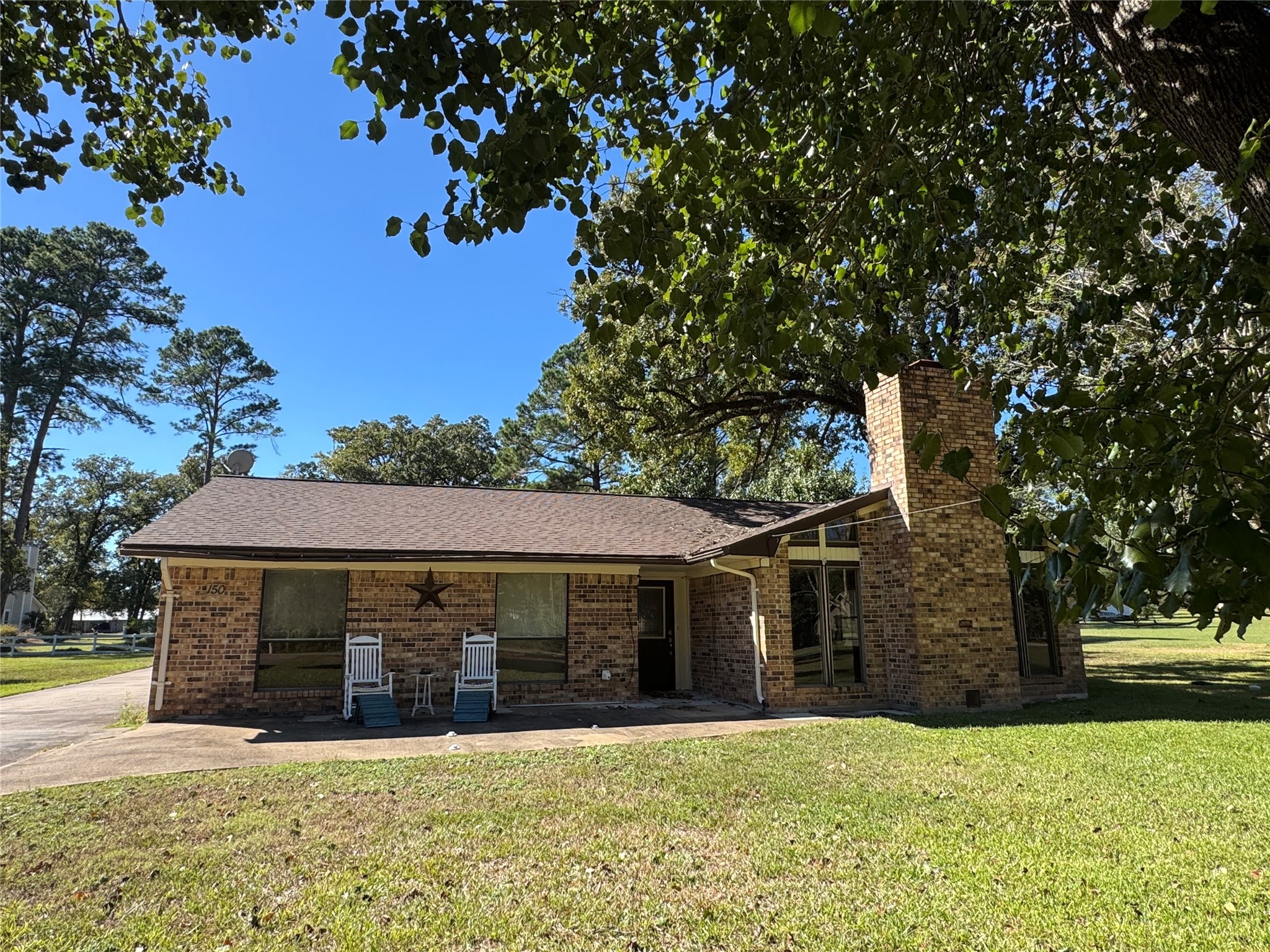 150 Schooner Drive Trinity, TX 75862 - Photo 6 of 49 a front view of a house with a yard