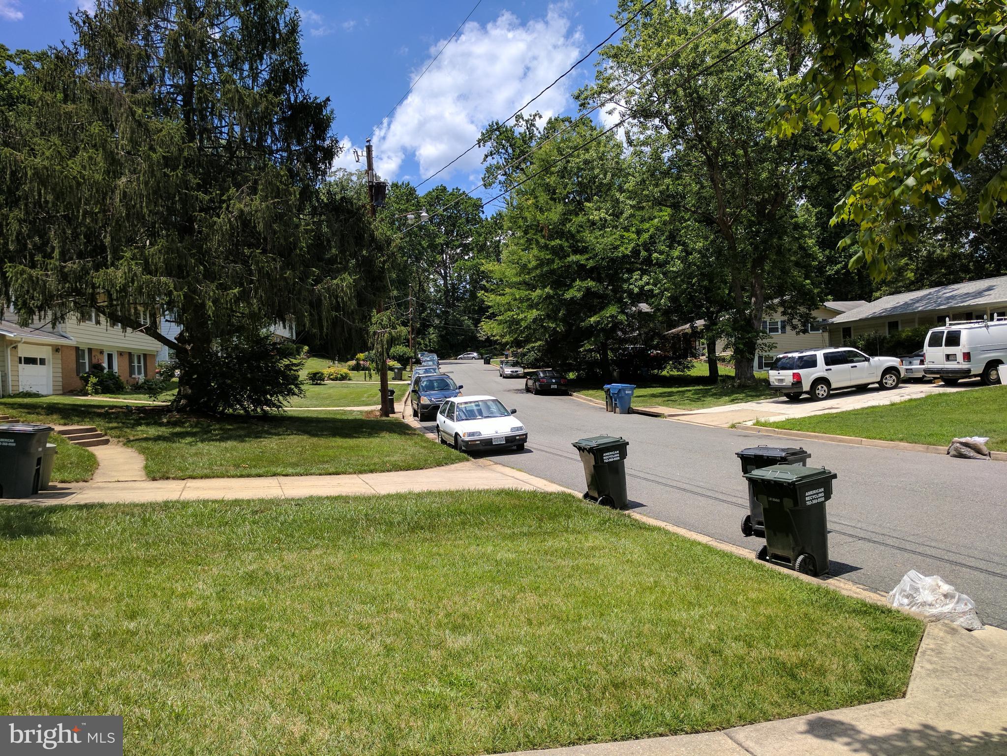 8207 Old Oaks Drive Springfield, VA 22152 - Photo 21 of 21 a swimming pool with outdoor seating and yard