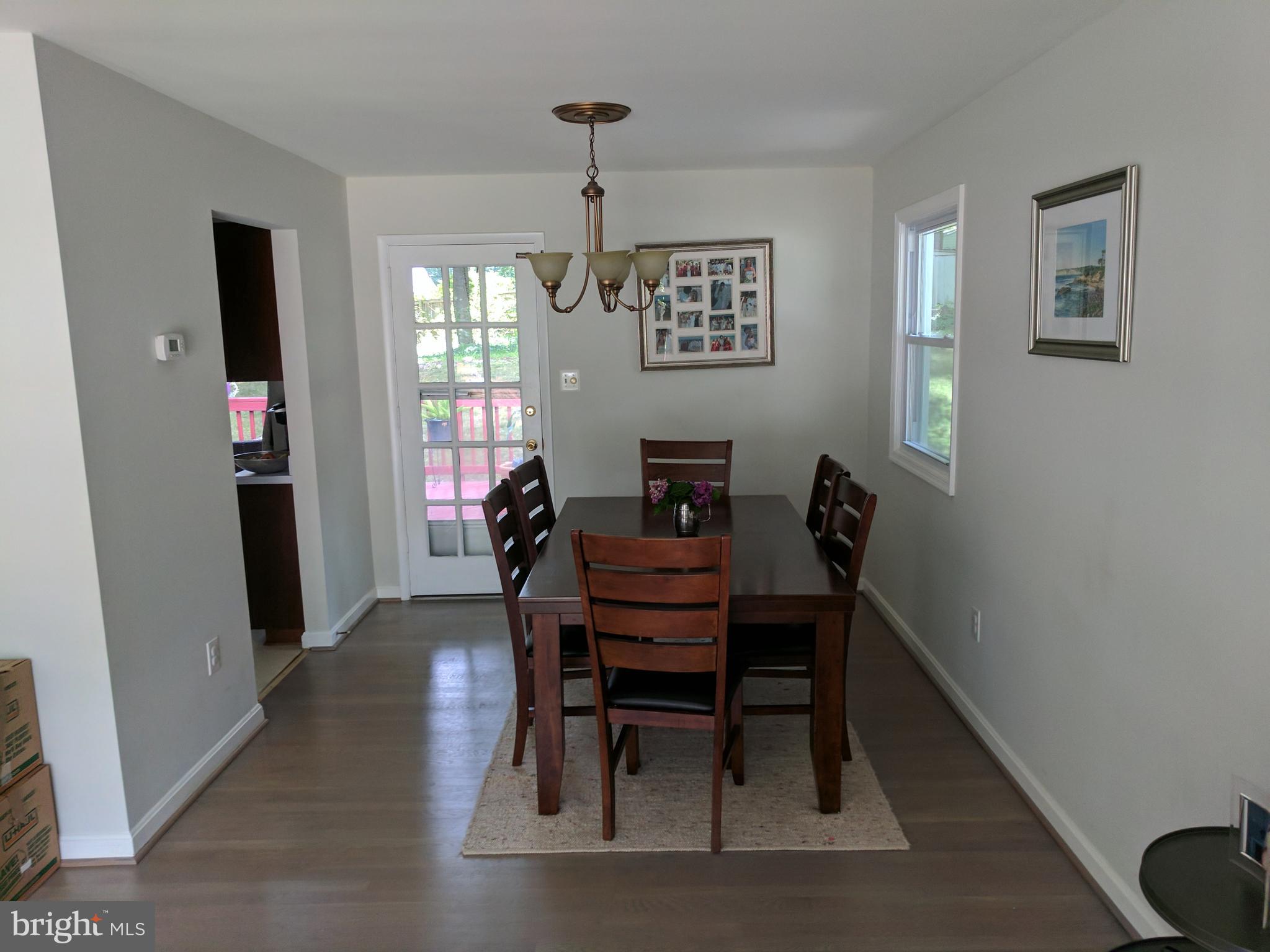 8207 Old Oaks Drive Springfield, VA 22152 - Photo 4 of 21 a dining room with furniture and window