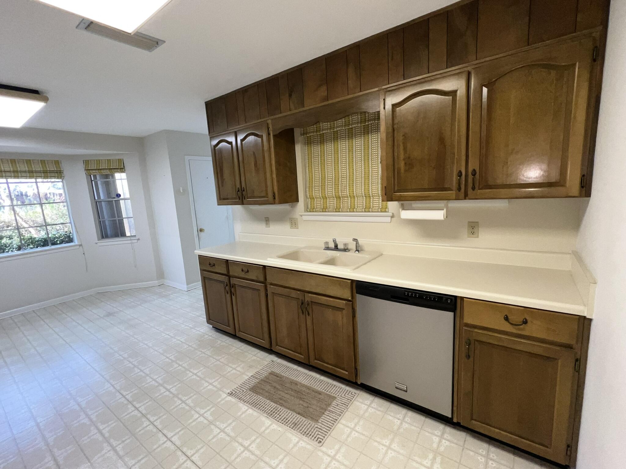 18 Sherwood Road Northwest Fort Walton Beach, FL 32547 - Photo 13 of 49 a spacious bathroom with a double vanity sink and mirror