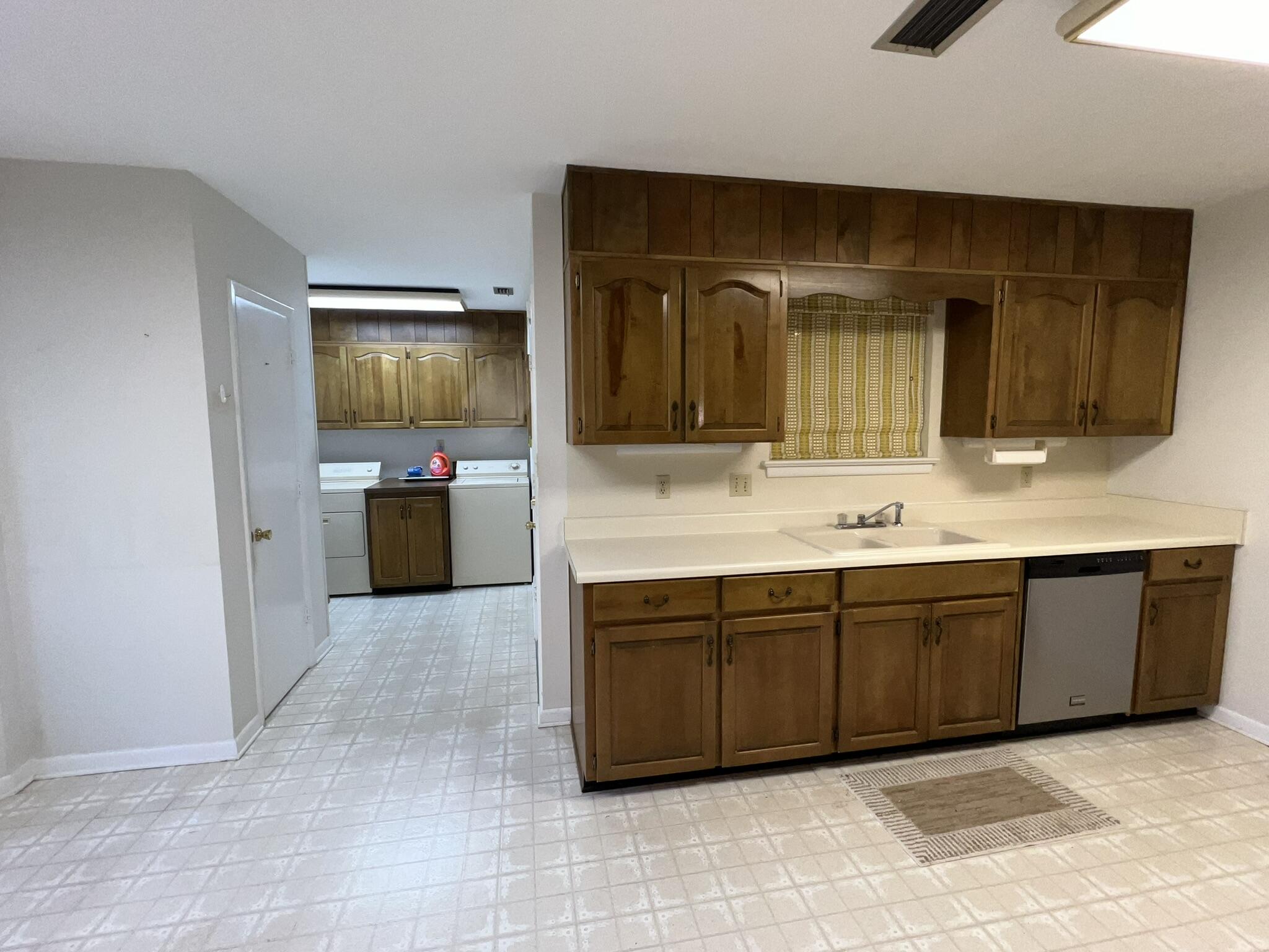 18 Sherwood Road Northwest Fort Walton Beach, FL 32547 - Photo 15 of 49 a spacious bathroom with a granite countertop sink and a mirror
