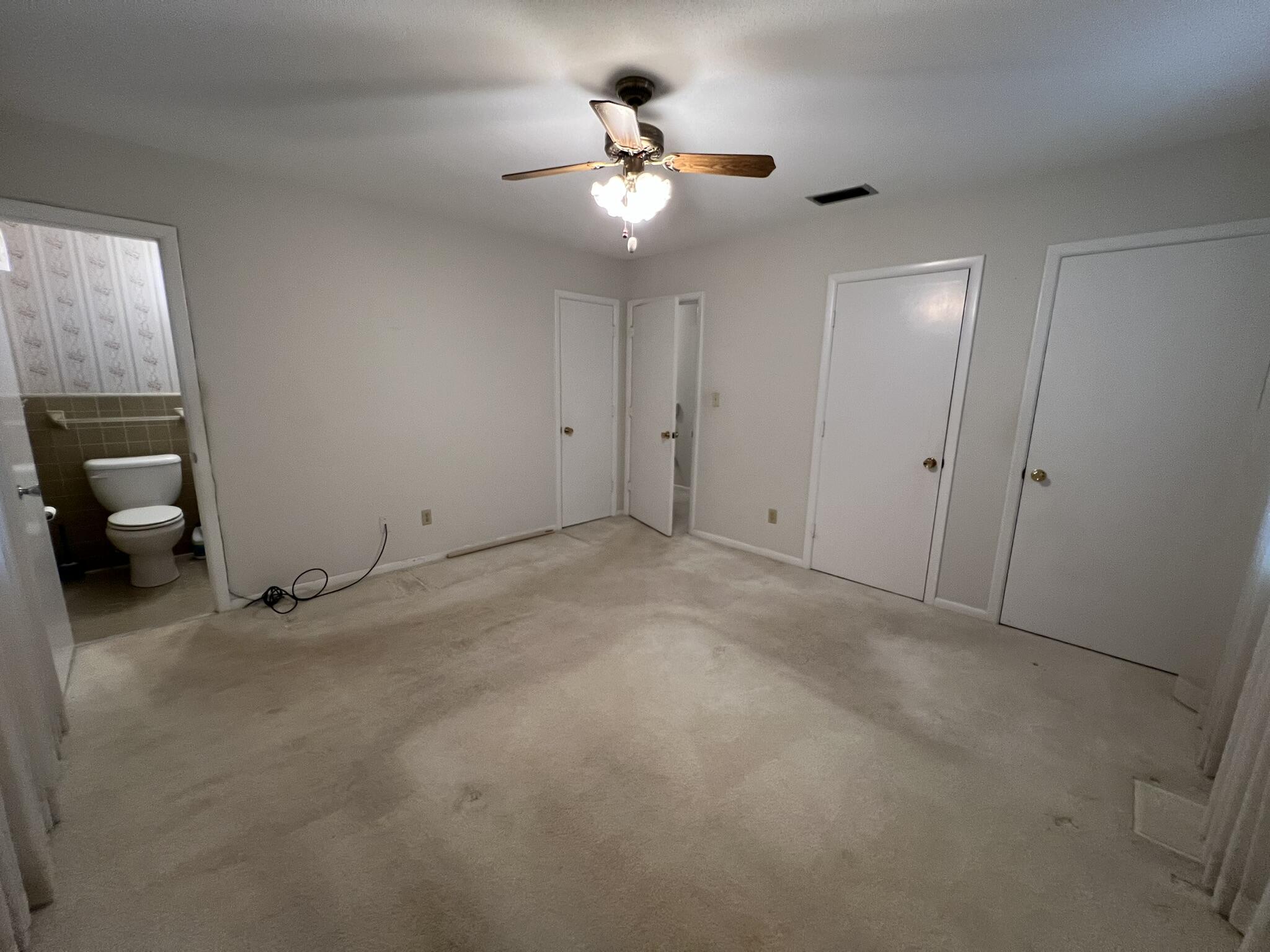 18 Sherwood Road Northwest Fort Walton Beach, FL 32547 - Photo 22 of 49 a view of a livingroom with a ceiling fan and window