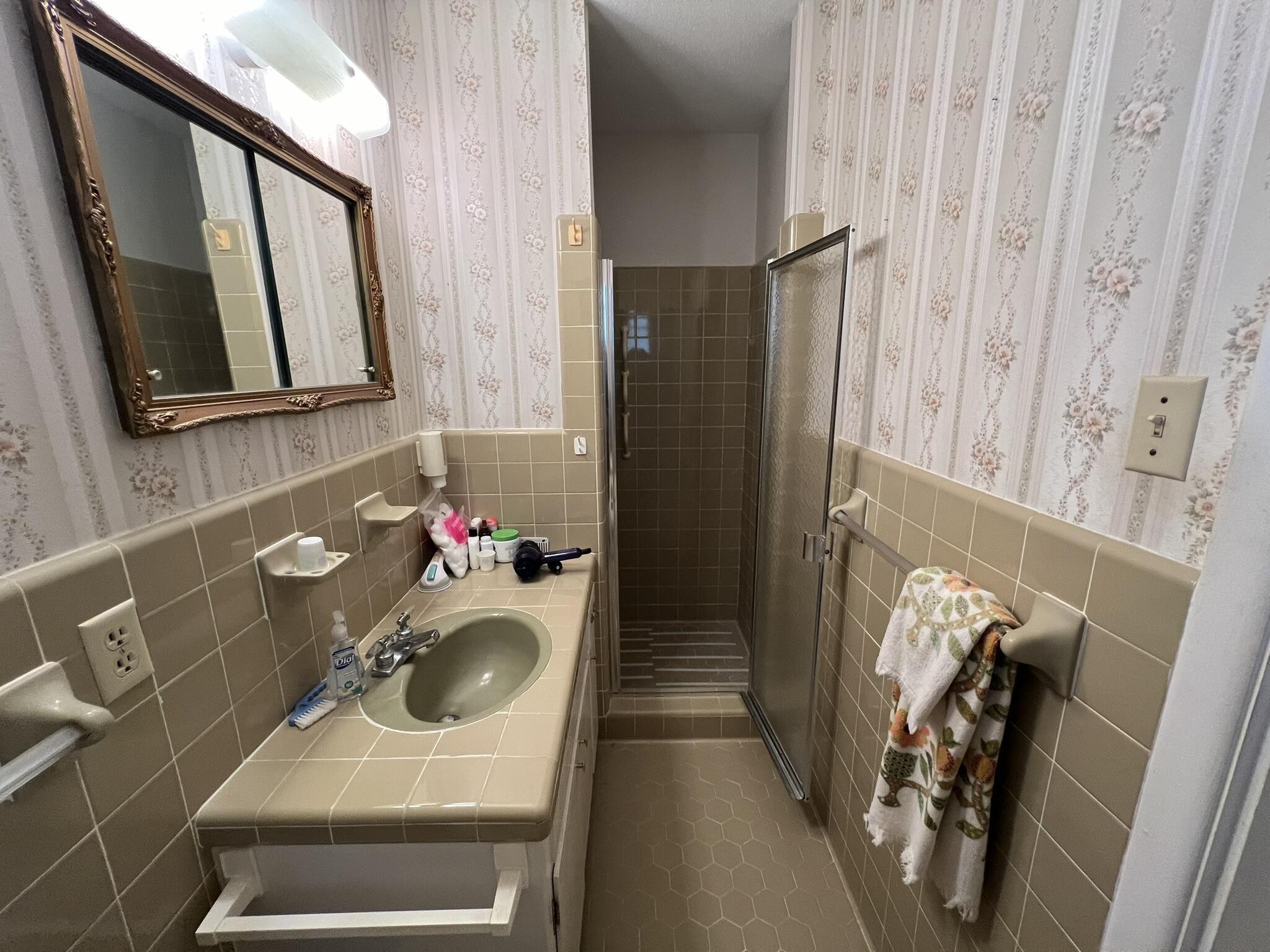 18 Sherwood Road Northwest Fort Walton Beach, FL 32547 - Photo 24 of 49 a bathroom with a sink toilet and shower