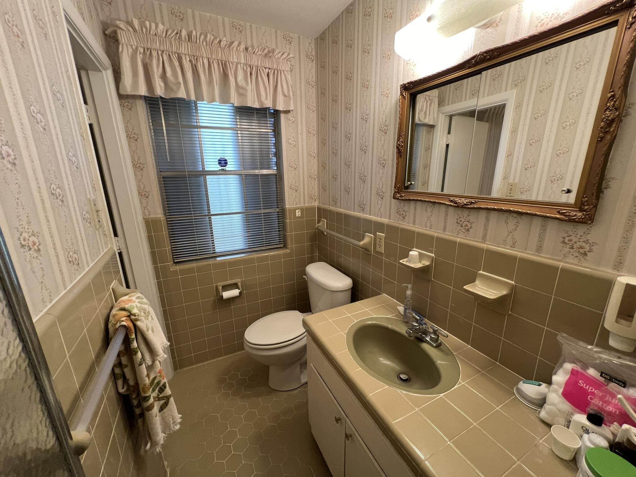18 Sherwood Road Northwest Fort Walton Beach, FL 32547 - Photo 26 of 49 a bathroom with a sink toilet and shower