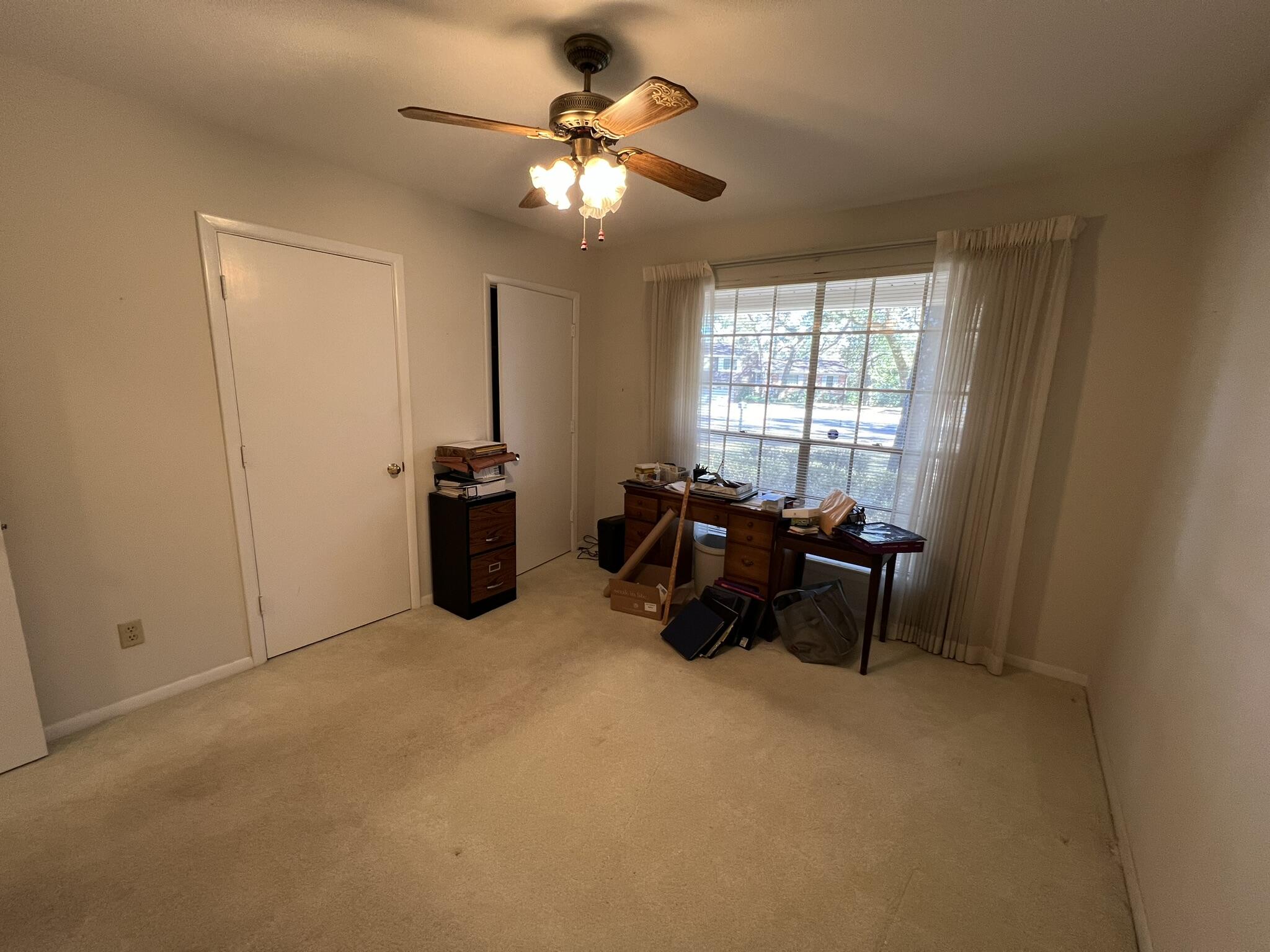 18 Sherwood Road Northwest Fort Walton Beach, FL 32547 - Photo 31 of 49 a bed room with furniture and a window