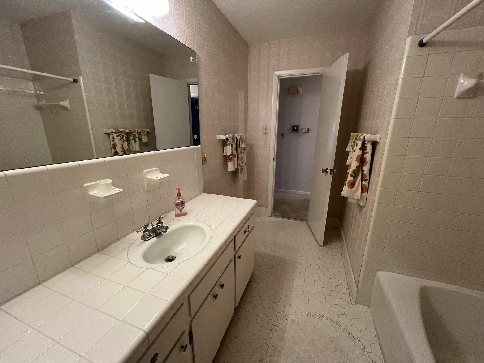 18 Sherwood Road Northwest Fort Walton Beach, FL 32547 - Photo 34 of 49 a bathroom with a sink a toilet and shower