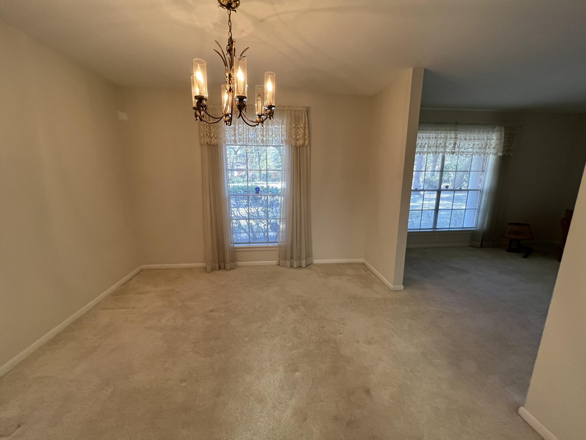 18 Sherwood Road Northwest Fort Walton Beach, FL 32547 - Photo 6 of 49 a view of an empty room with a window