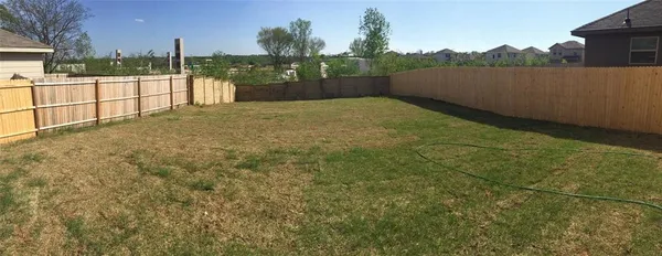 a view of a lake with a houses
