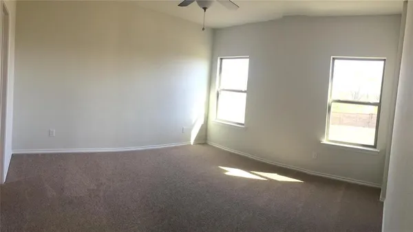 an empty room that has a window