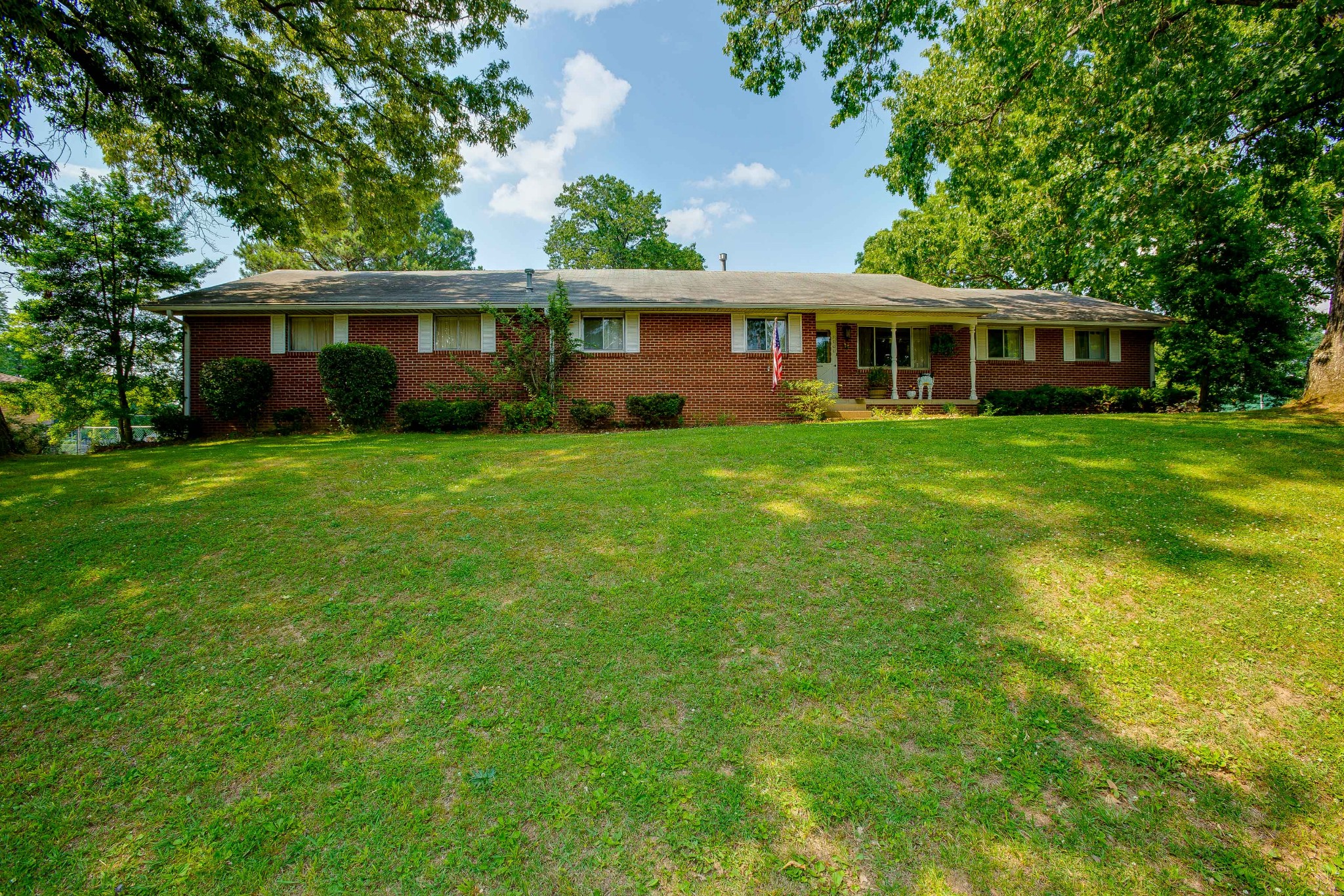 5101 New Chapel Road Springfield, TN 37172 - Photo 1 of 41 a front view of a house with a garden