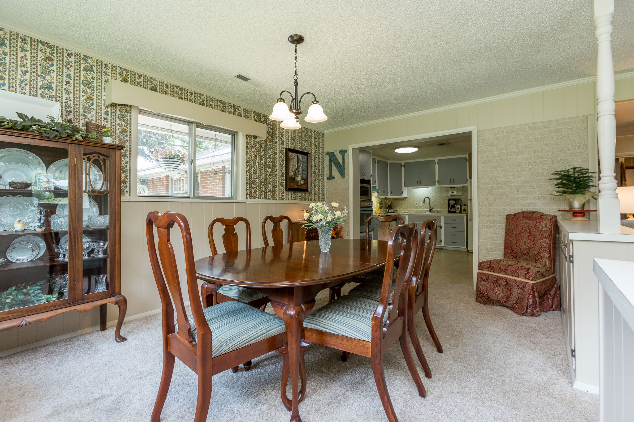 5101 New Chapel Road Springfield, TN 37172 - Photo 17 of 41 a view of a dining room with furniture and chandelier
