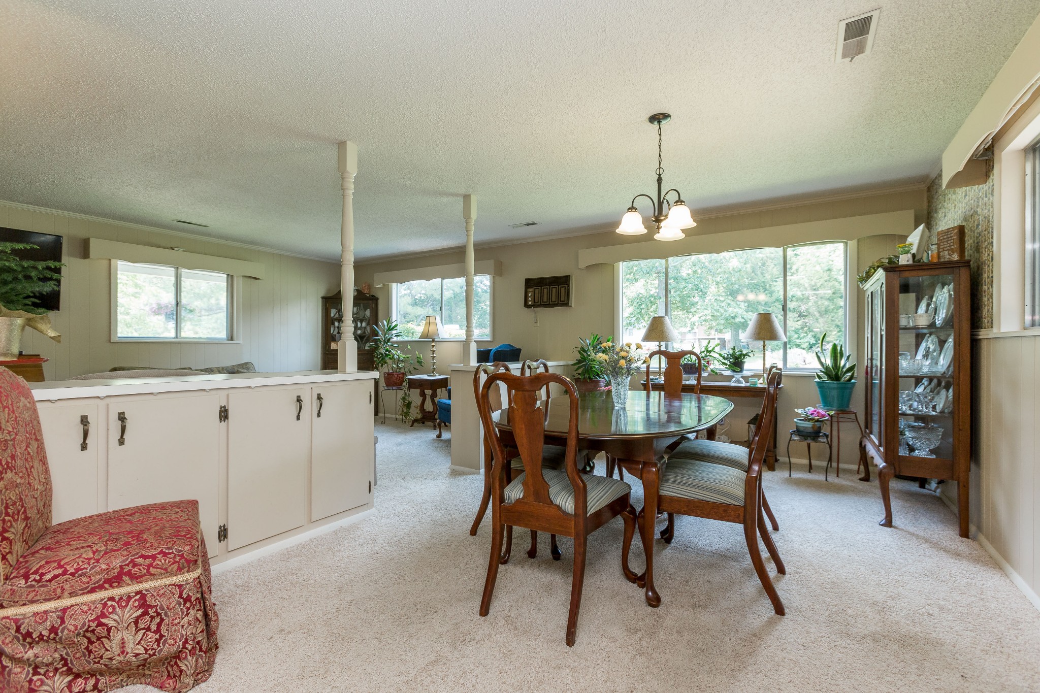 5101 New Chapel Road Springfield, TN 37172 - Photo 18 of 41 a dining room with furniture a chandelier and window