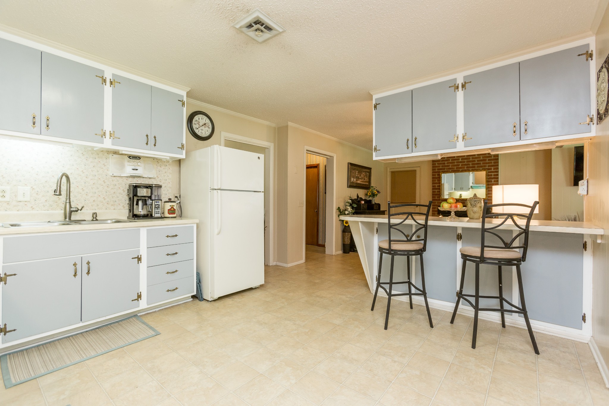 5101 New Chapel Road Springfield, TN 37172 - Photo 19 of 41 a kitchen with cabinets and chairs