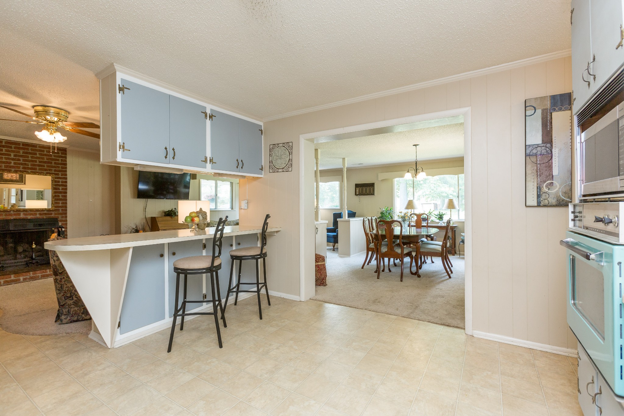 5101 New Chapel Road Springfield, TN 37172 - Photo 22 of 41 a view of kitchen with refrigerator stove dining table and chairs