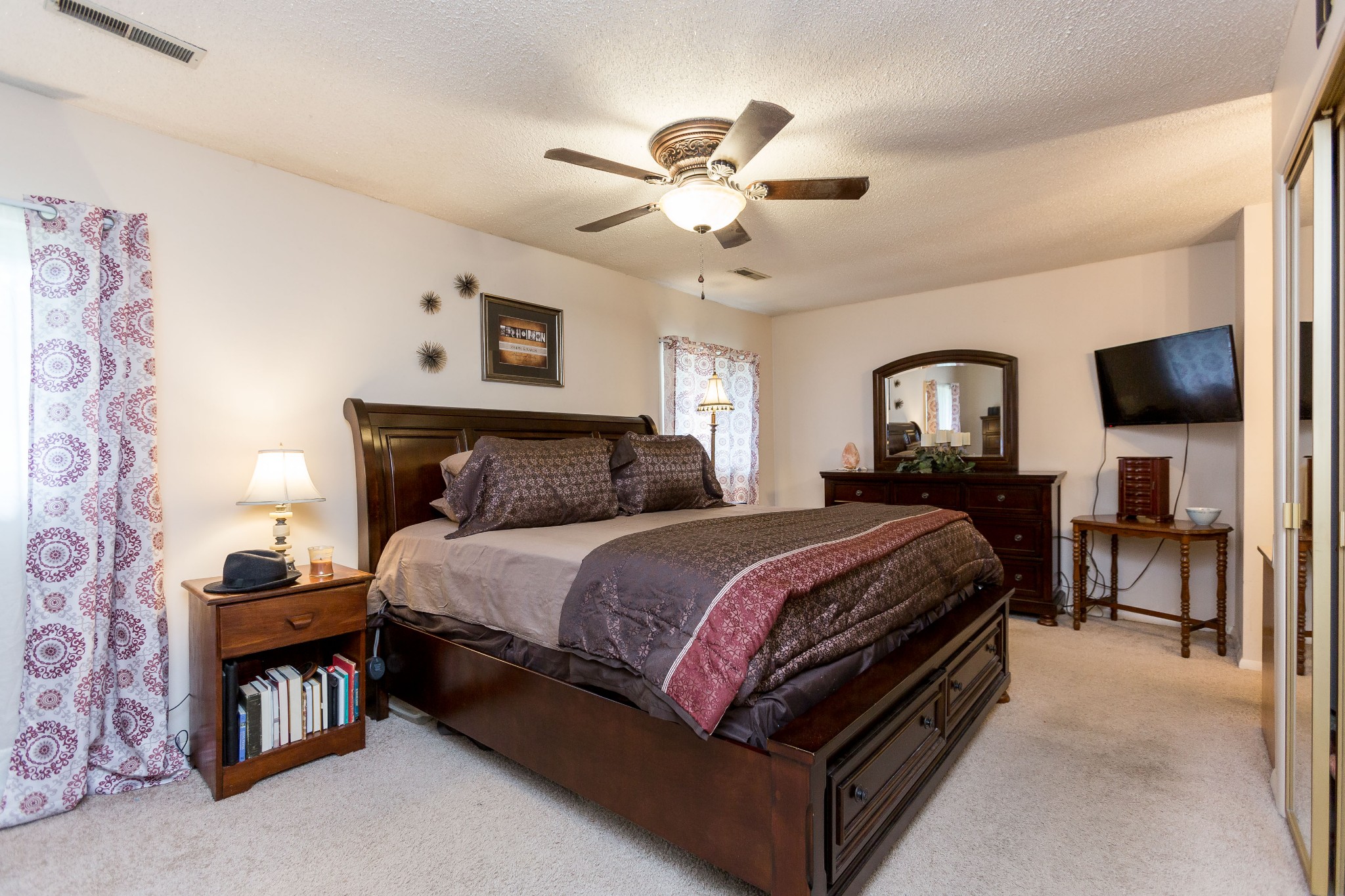 5101 New Chapel Road Springfield, TN 37172 - Photo 8 of 41 a bedroom with a bed and a chandelier