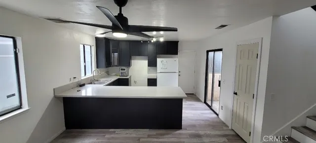 a hallway with cabinets