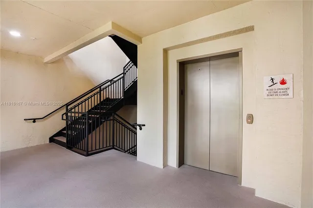 a view of entryway with stairs