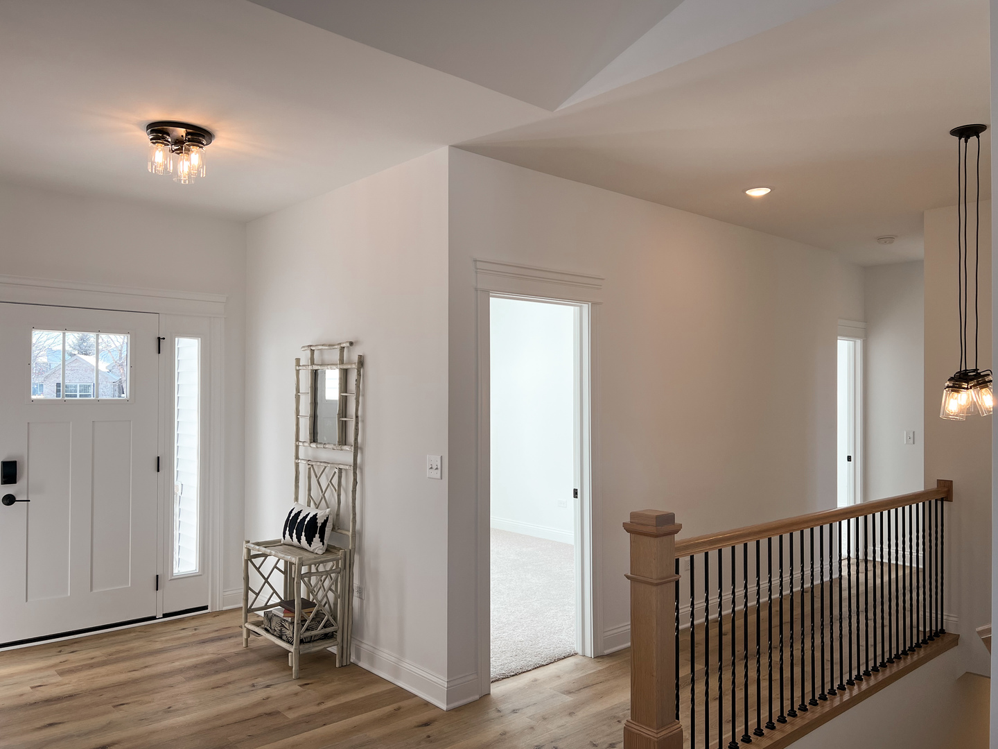 138 Trumpet Vine Circle Elgin, IL 60124 - Photo 2 of 46 a view of a hallway with bedroom and wooden floor