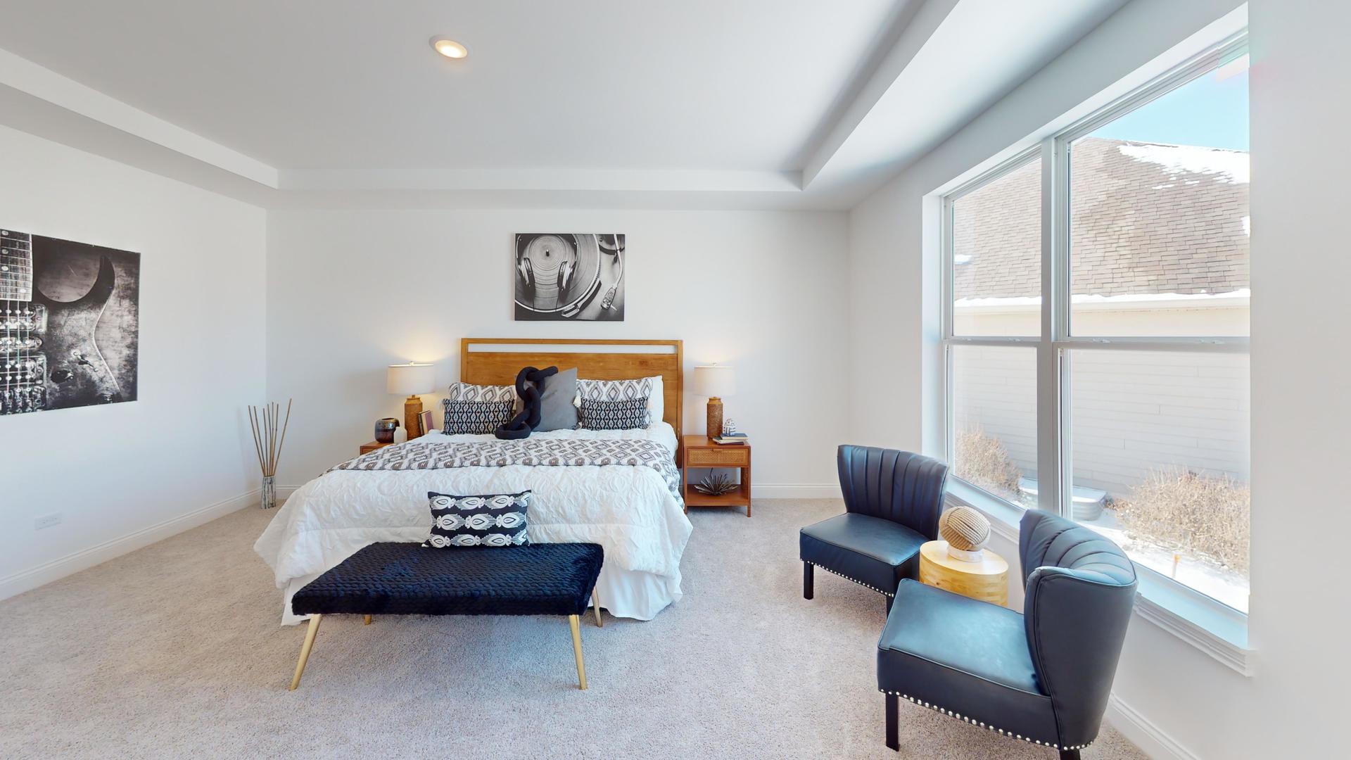 138 Trumpet Vine Circle Elgin, IL 60124 - Photo 29 of 46 a bedroom with furniture and a window